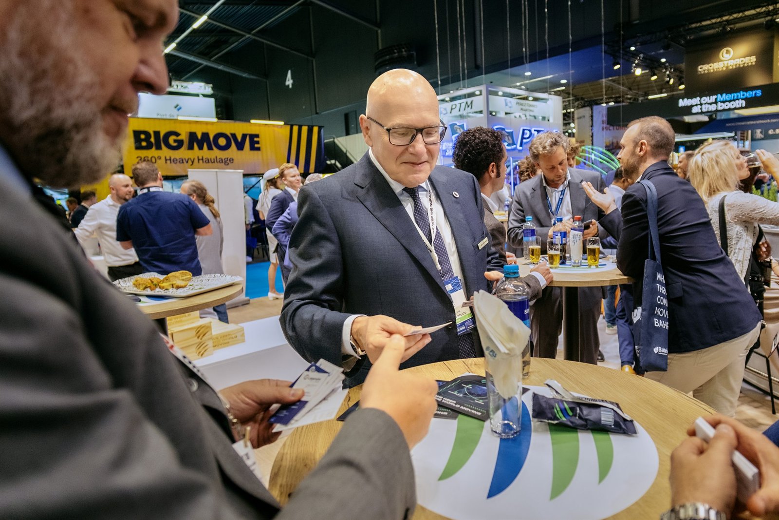 Guests taking part in an activation at the FLS Group booth