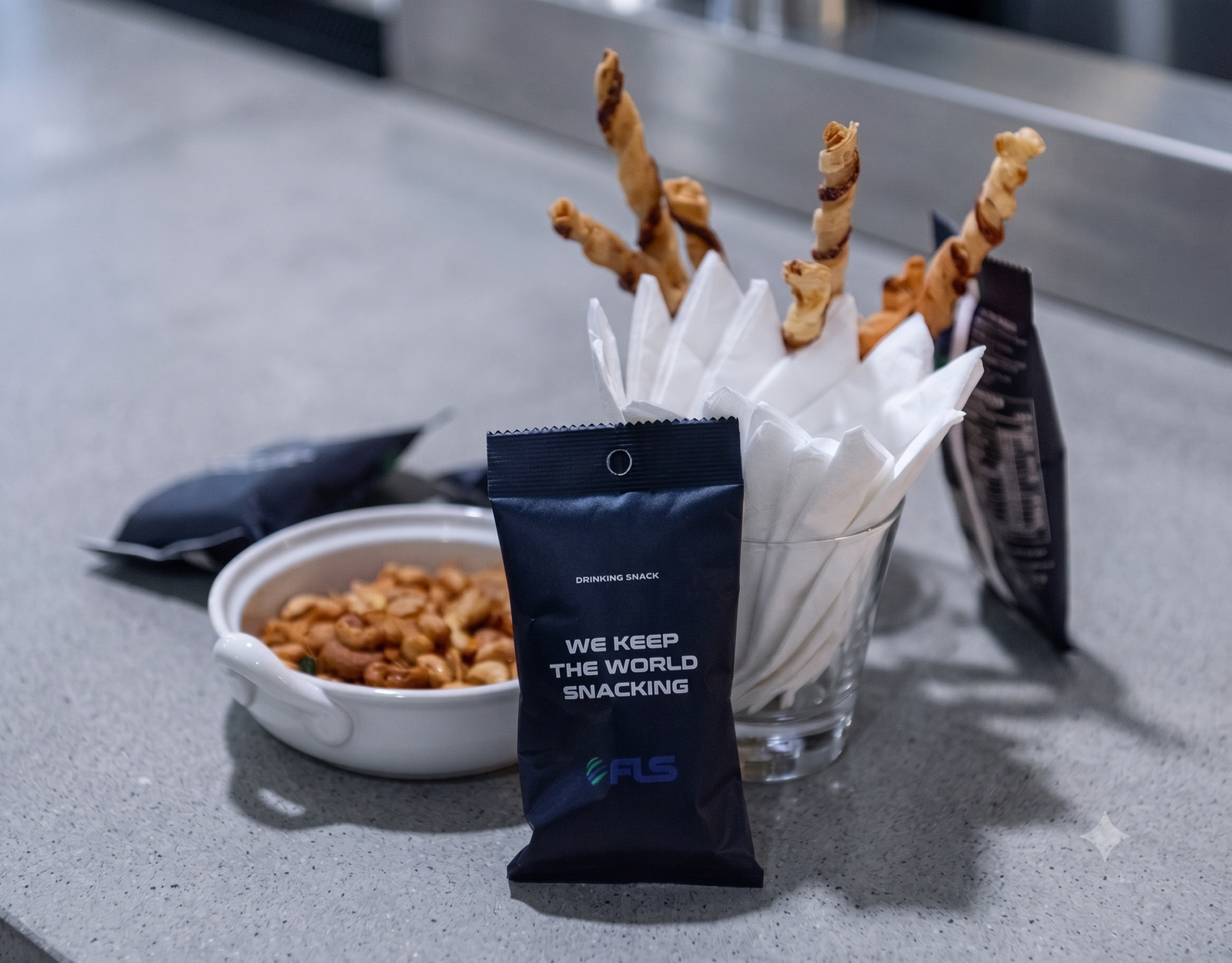 FLS We Keep The World Snacking branded snack pack